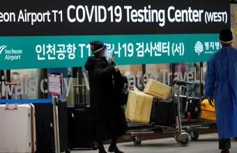 cocid κινα αεροδρομιο