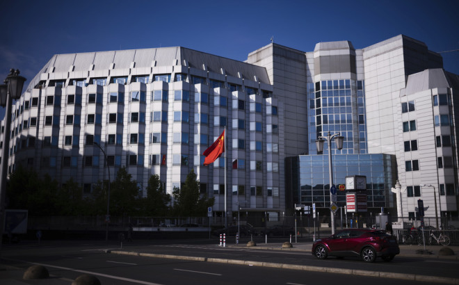 The Chinese national frag in front of the country's embassy in Berlin