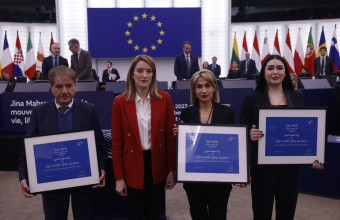 Iranian women's rights defenders Afsoon Najafi, right, Mersedeh Shahinkar, second right, Saleh Nikbakht, academic, lawyer representing Jina Mahsa Amini's family, left, and President of the European Parliament Roberta Metsola