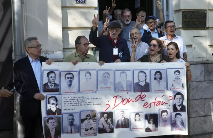Paraguay - Torture Trial - Former political detainees shout slogans against the dictator Alfredo Stroessner dictatorship 