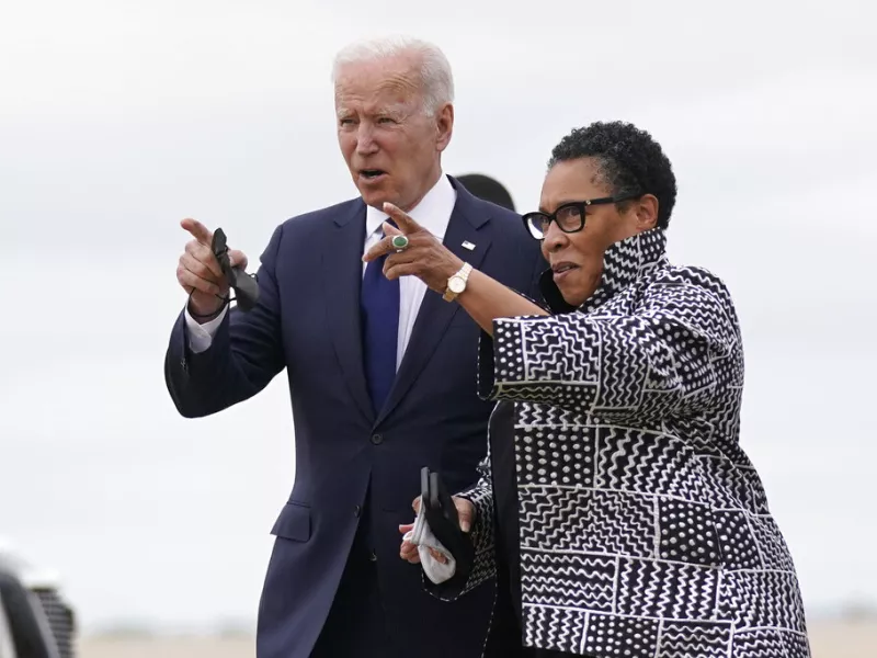 President Joe Biden walks with Housing and Urban Development Secretary Marcia Fudge