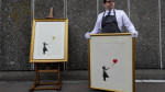 Banksy: Το μισοκατεστραμμένο έργο του «Το Κορίτσι με το Μπαλόνι» πωλήθηκε αντί 21,8 εκατ. ευρώ